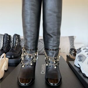 CHANEL Black Heeled Boots with Gold Chains